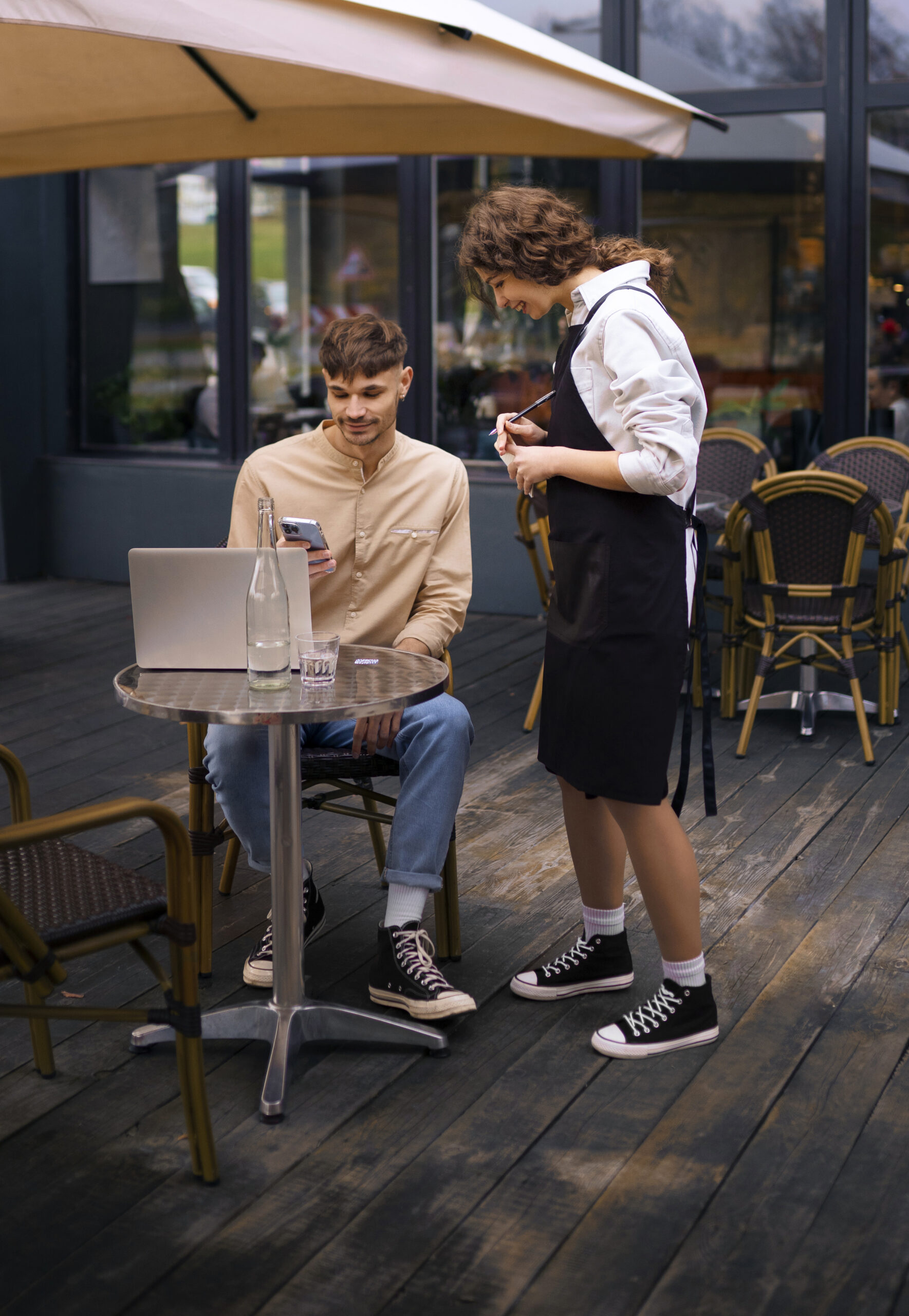 A customer ordering at a restaurant